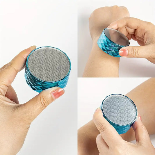 Blue diamond-textured foot file for callus removal, shown in hand and use on skin