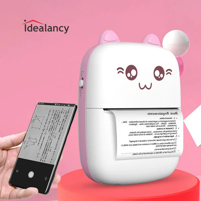 Cute pink portable printer with cat ears printing from smartphone, ideal for kids and crafts